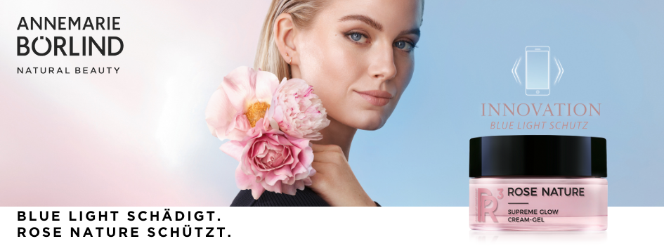 Porträt einer Frau mit Blume, links daneben das Logo ‚ANNEMARIE BÖRLIND – Natural Beauty‘ und Text: ‚Blue Light schädigt. Rose Nature schützt. Rechts neben der Frau ist ein rosa Tiegel des Rose Nature Supreme Glow Cream-Gel.