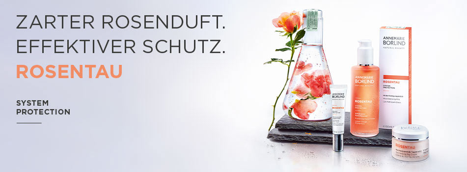 Pflegeserie mit Rosenduft in rosa-oranger Verpackung, begleitet von Rosen und Wasserperlen.