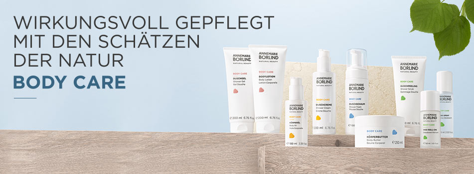 Pflegelinie für den Körper, darunter Lotionen und Cremes, präsentiert vor einem grünen Blätterhintergrund
