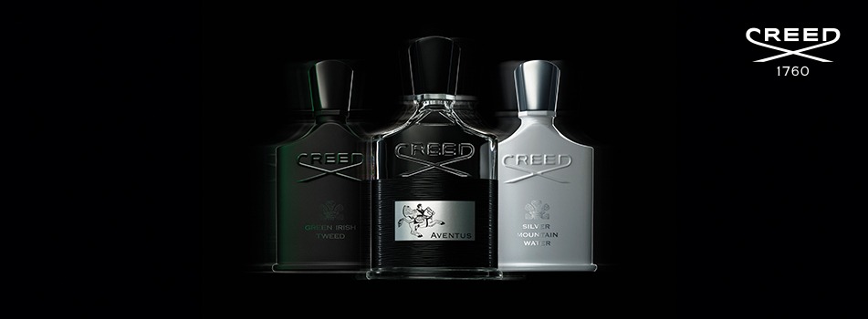 Drei edle Creed Parfumflakons vor schwarzem Hintergrund: Green Irish Tweed, Aventus und Silver Mountain Water. Rechts oben das weiße Creed-Logo mit Gründungsjahr 1760.