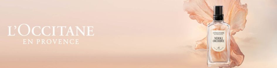 L'Occitane en Provence – Kategoriebanner Düfte mit Néroli Orchidée Eau de Toilette vor zarter Orchideenblüte und Pastellhintergrund